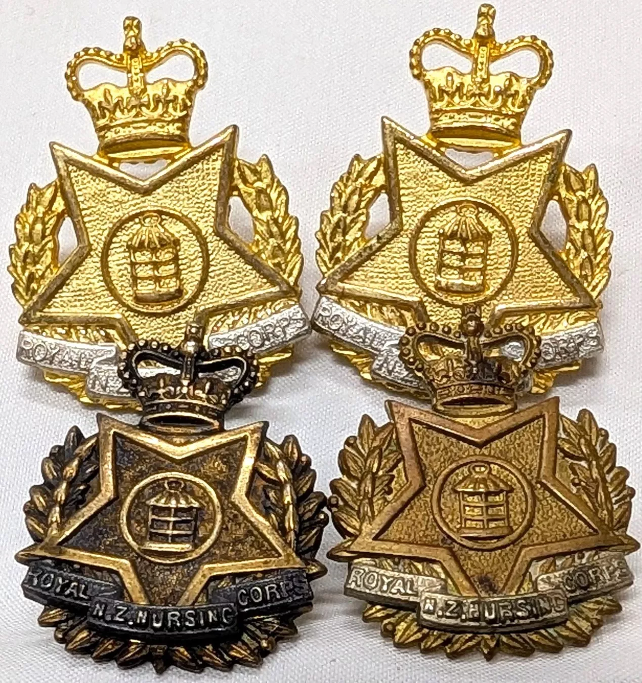 Post WW2 Royal New Zealand Nursing Corps uniform collar or cap badges